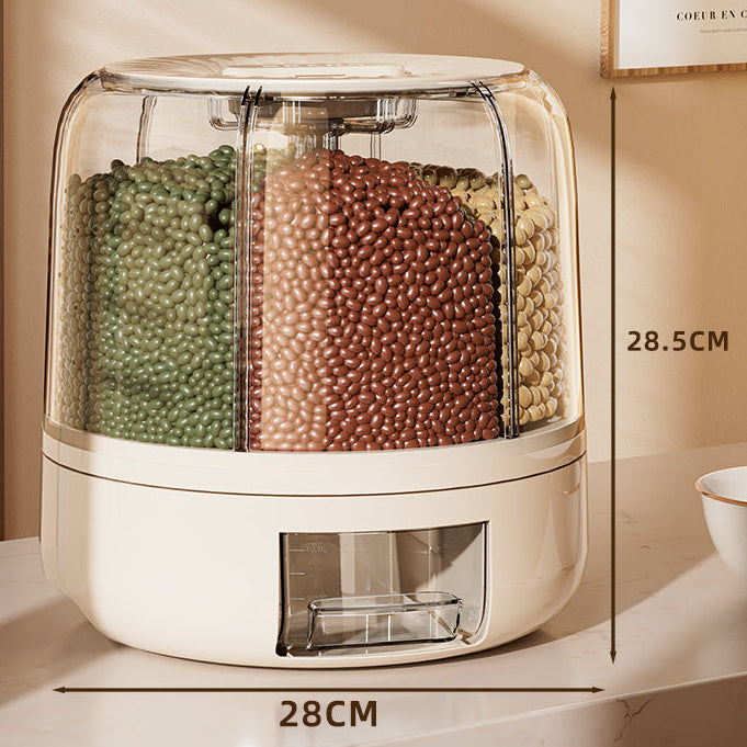 Container with compartments filled with green, brown, and beige beans on a marble surface.