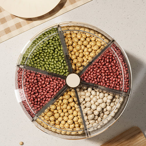 Round organizer with compartments for different types of beans on a neutral background