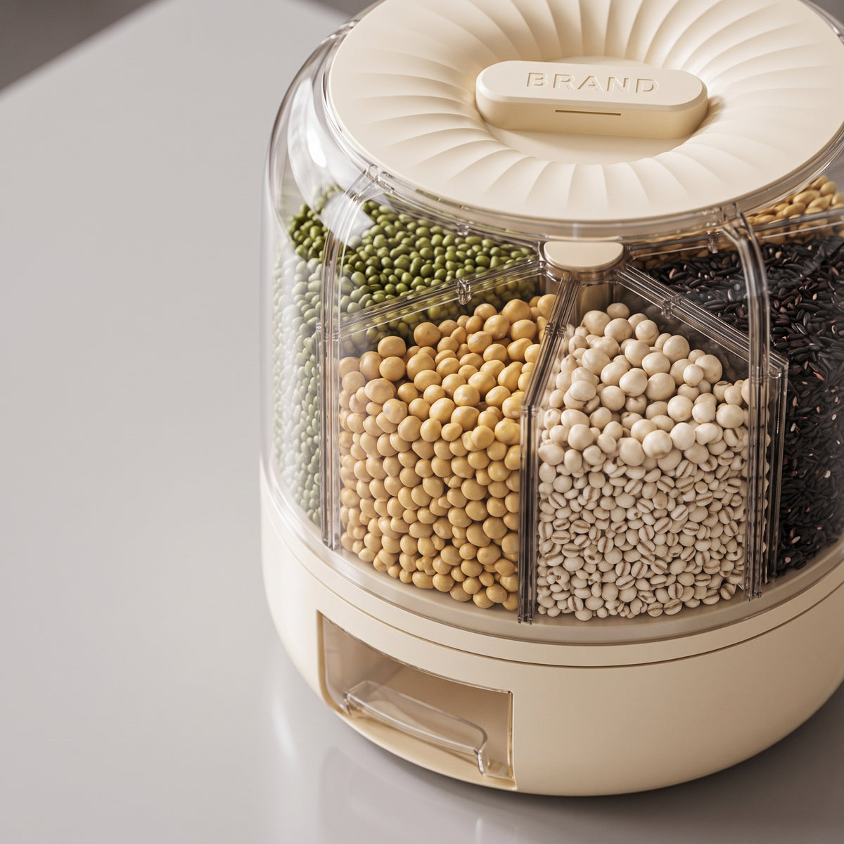 detail: A new photorealistic photograph composed from scratch. A close-up view of the product resting on a clean, smooth, light grey kitchen island surface with a subtle, soft reflection. The upper transparent section of the product reveals six distinct compartments, each filled with different types of dry goods, such as various grains and cereals. Photographed with a slightly overhead macro camera angle and a 100mm macro lens, using a very shallow depth of field f/1.8 to isolate the product details. Diffu…